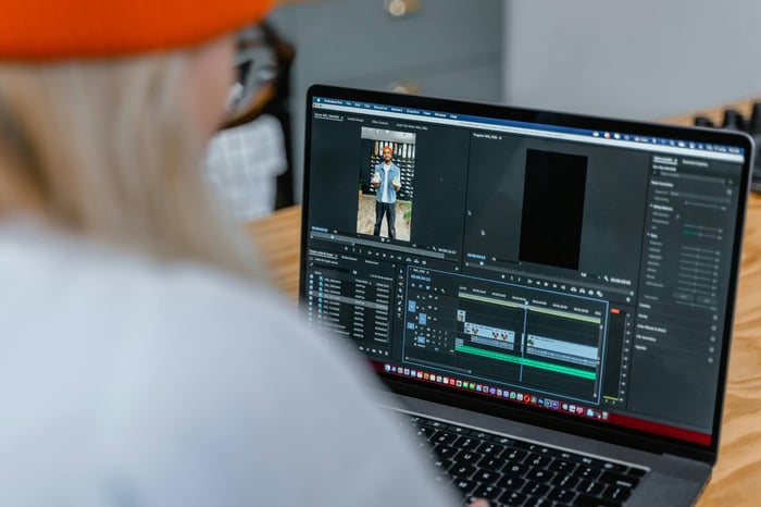 content creator adding detailed timestamps and a structured outline to a video description for AI visibility